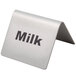 A Tablecraft stainless steel "Milk" tent sign on a counter.