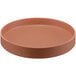 A brown round plate with a raised rim.
