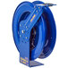 A blue metal Coxreels hose reel with yellow text.