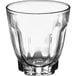 An Arcoroc Arcadie rocks glass with a low rim on a white background.