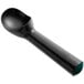 A black plastic ice cream scoop with a green handle.