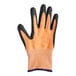 A close up of an orange and black Mercer Culinary Millennia food processing glove with black and orange palm.