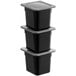 A stack of three black Vigor 1/6 size plastic food pans with secure sealing covers.