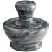 A black and white marbled Fox Run mortar with an extra large pestle inside.