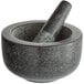 A Fox Run Black Granite Mortar and Pestle Set with a stone handle.