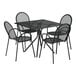 A black metal table and chairs set by Lancaster Table & Seating.