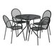 A black Lancaster Table & Seating outdoor table with modern legs and four chairs.