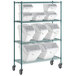 A green metal Baker's Mark shelving unit with white plastic bins.