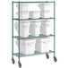 A white plastic container on a metal shelf with a green pole with 10 white clip-in shelf bins.