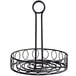 A black round wrought iron condiment caddy with a spiral design and a handle.