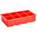 A red silicone ice mold with 8 cube compartments.