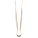 A pair of Thunder Group beige flat grip tongs with a white background.