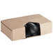 A cardboard box with rolls of Lavex Hercules black garbage bags inside.