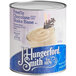 A J. Hungerford Smith #10 can of chocolate shake base with a spoon.