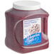A plastic container of J. Hungerford Smith red raspberry dessert topping.