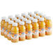 A group of Ruby Kist orange juice bottles.