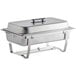 A silver stainless steel Choice Economy chafer with lid on a table outdoors.