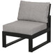 A POLYWOOD Edge black and gray modular armless chair with a gray cushion.