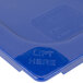 A blue plastic lid with white text that says "Carlisle Smart Lid" and "Lift Here".