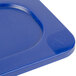 A blue Carlisle Smart Lid for a 1/9 size food pan on a blue plastic surface.