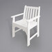 A white POLYWOOD Vineyard garden arm chair with wooden arms.