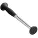 An OXO stainless steel muddler with a black nylon handle and head.