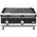 A close up of a Vollrath Cayenne medium-duty charbroiler with two burners and knobs.