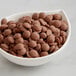 A bowl of Callebaut milk chocolate chips.
