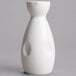 A close-up of a white porcelain Fuji Sake bottle.