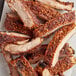 A plate of ribs seasoned with Regal Smoke Pit Maple Seasoning.