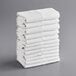 A stack of white folded Choice kitchen towels.