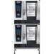 A Rational double deck electric combi oven with two open doors.