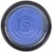 A close-up of a blue Elite Global Solutions Monet melamine plate with a spiral pattern on the rim.