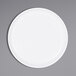 An Elite Global Solutions white melamine plate with a raised white rim on a gray surface.