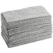 A stack of Unger MicroWipe Pro gray microfiber cloths.