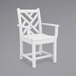 A white POLYWOOD Chippendale dining arm chair with a wooden frame.
