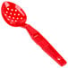 A red plastic Cambro salad bar spoon with holes in the bowl.