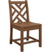 A brown POLYWOOD Chippendale teak dining side chair with a cross pattern on it.