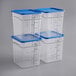 Three Vigor 18 Qt. clear square polycarbonate food storage containers with blue lids.