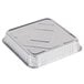 An 8" square silver foil cake pan with a lid.