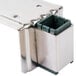 A metal corner of a Base Plate for a Heavy Duty Can Opener with a green square.