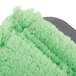 A green Unger SmartColor microfiber mop pad.