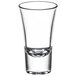 A clear Libbey shot glass with a small rim.