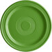 A close-up of a green Acopa Capri stoneware plate with a circular pattern.