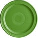 A close-up of an Acopa Capri palm green stoneware plate with a circular pattern.