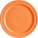 An Acopa Capri Valencia orange stoneware plate with a circular design.