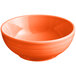 An Acopa Capri Valencia orange stoneware bowl.