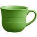 An Acopa Capri palm green stoneware cup with a handle on a white background.