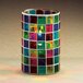 A Sterno Mosaic liquid candle holder with colorful squares.