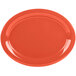 A Rio orange oval melamine platter on a white background.